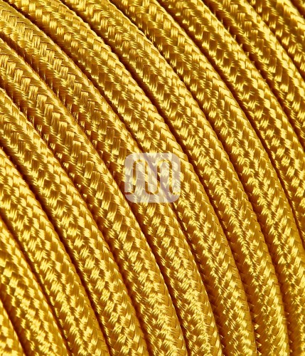 Câble électrique flexible rond gainé de tissu coloré or.