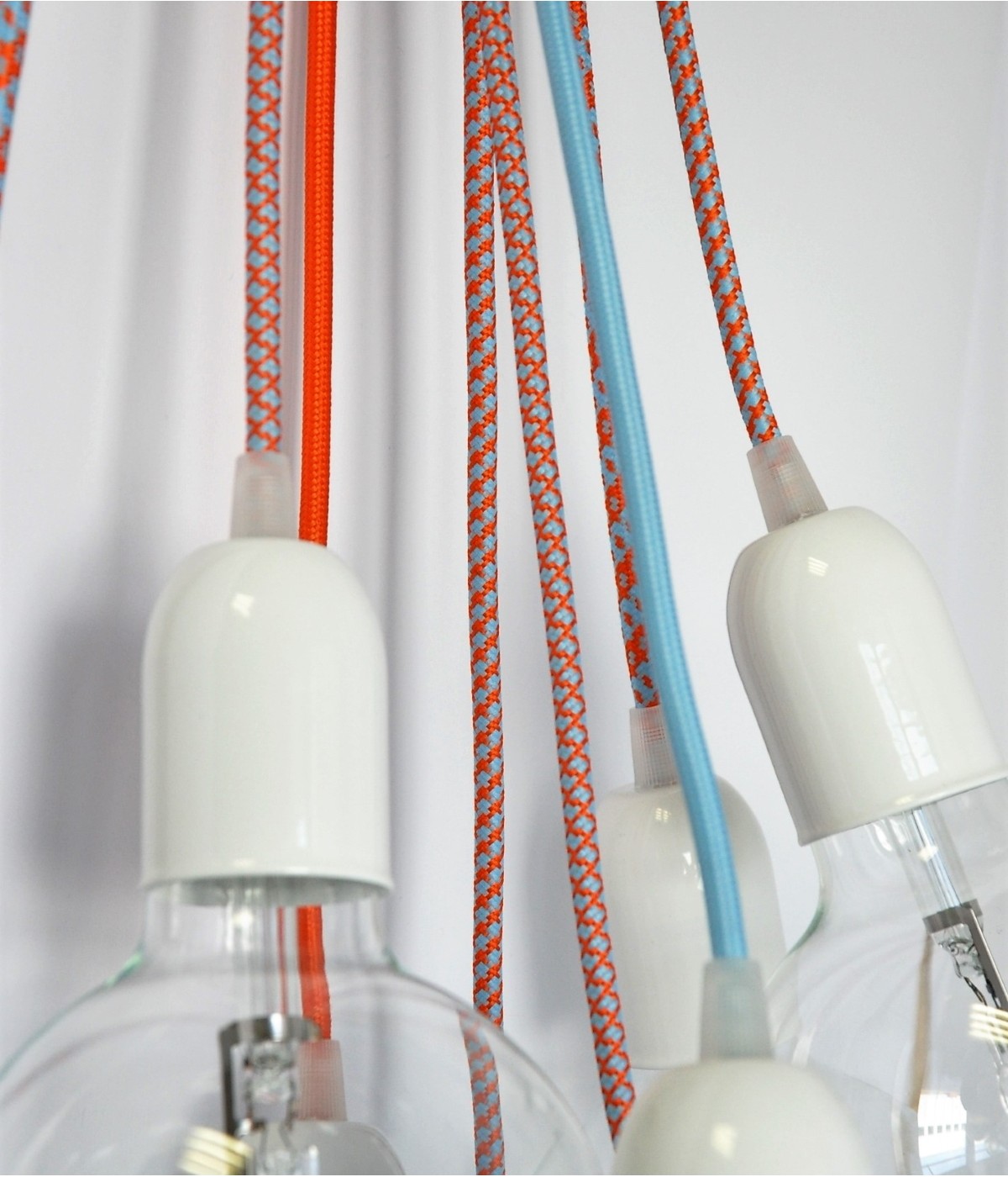 Câble électrique flexible rond gainé de tissu coloré orange