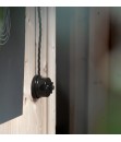 invertitore rotativo in ceramica nero per impianti elettrici sul muro